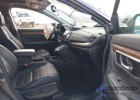 2019 Honda Cr-V Touring z USA, uszkodzony, nr VIN 5J6RW2H91KL001951